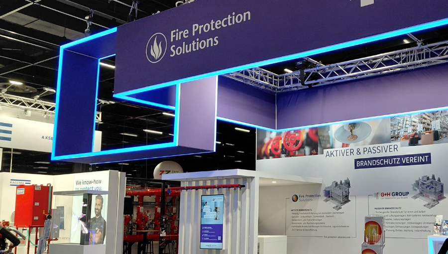 Messestand von Fire Protection Solutions und G+H Group mit Präsentation von aktivem und passivem Brandschutz